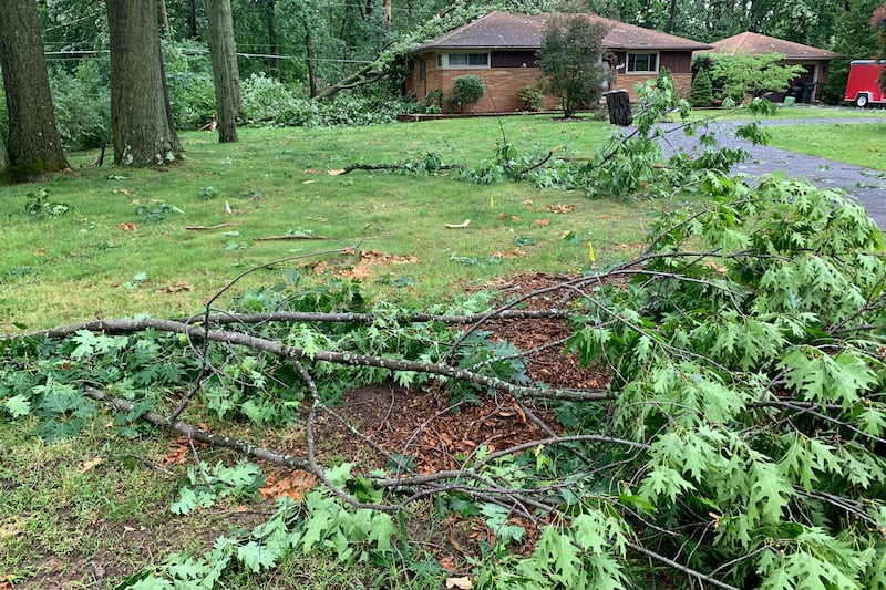 Officials in Livonia said in a post on the city’s website that a quick-developing tornado struck several neighbourhoods in the city on Wednesday afternoon (Robin Buckson/Detroit News via AP)