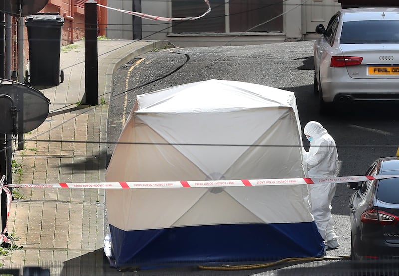 Forensics at scene of a suspect death in the Harvey Street area of Derry city on Saturday. A womans body was discovered in a house after a fire in the building. Picture Margaret McLaughlin  24-8-2024