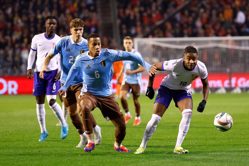 France held on to claim a 2-1 win over Belgium in Brussels (Geert Vanden Wijngaert/AP)