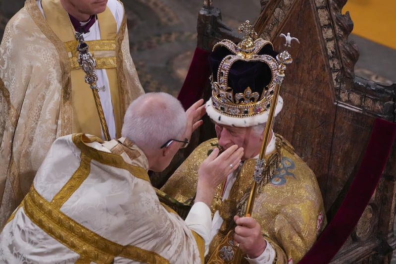 The King being crowned with St Edward’s Crown by Mr Welby