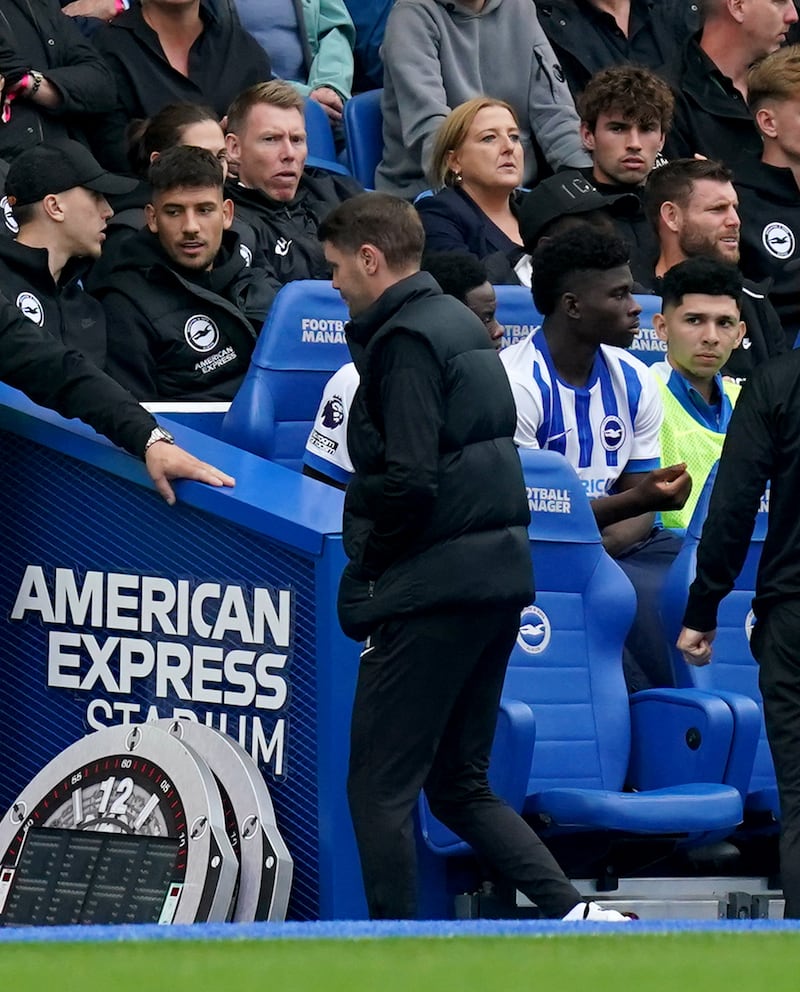 Brighton coach Fabian Hurzeler walks into the tunnel after being shown a red card