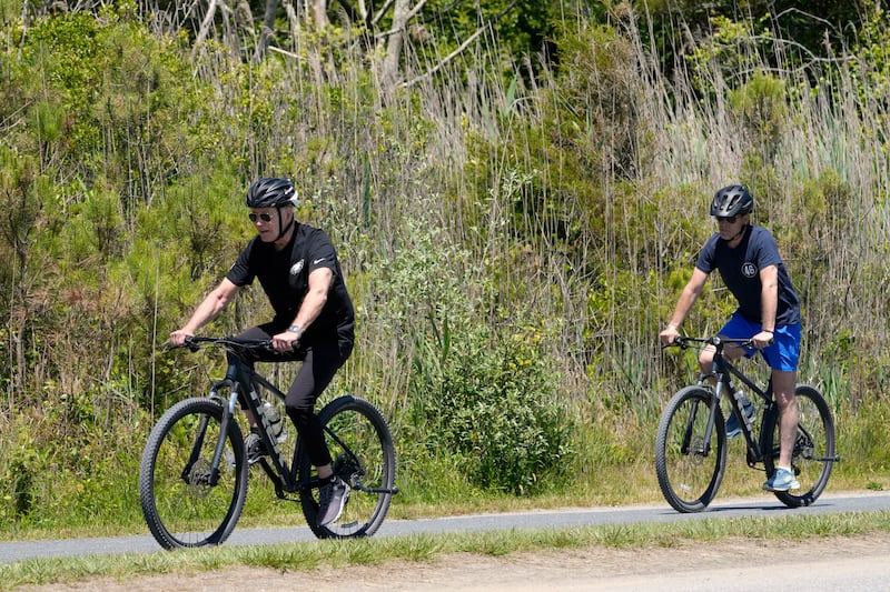 The US President was out biking with his son over the weekend (AP)