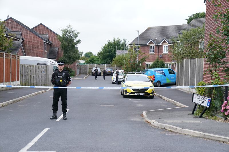 Emergency services at the home of 17-year-old Axel Rudakubana