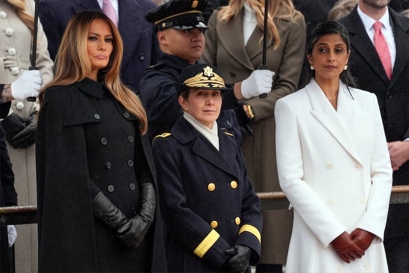 Melania Trump and Usha Vance arrive before President-elect Donald Trump participates in a wreath-laying ceremony at Arlington National Cemetery in Arlington, Virginia (Evan Vucci/AP)