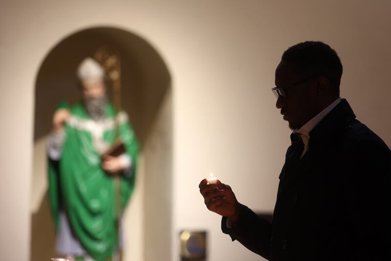 Parishioners young and old receive their ashes from Fr Tony and Fr Eugene at St Patricks Church in Donegall Street, Belfast marking the beginning of Lent