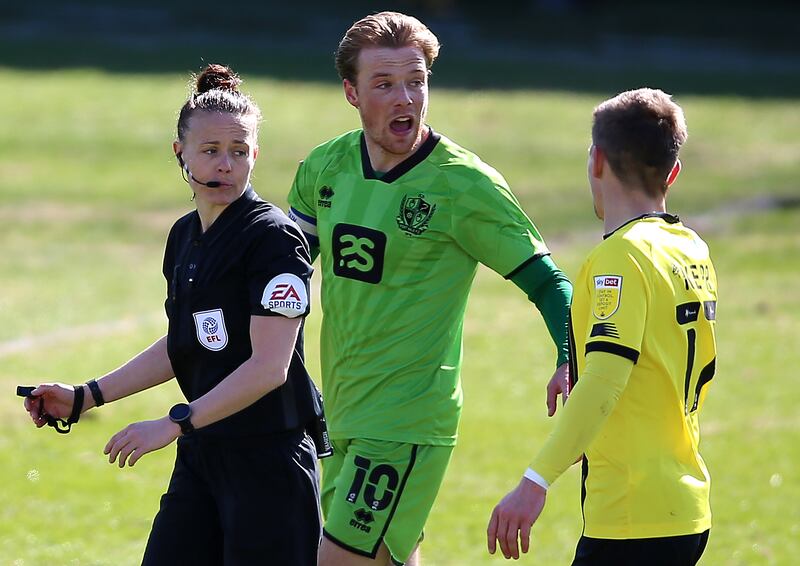 In 2021, Rebecca Welch (left) took charge of the League Two fixture between Harrogate and Port Vale