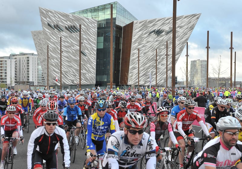 Cyclists pedal off at the start of Giro d&#39;Italia Gran Fondo at the Titanic Quarter in Belfast in June. 