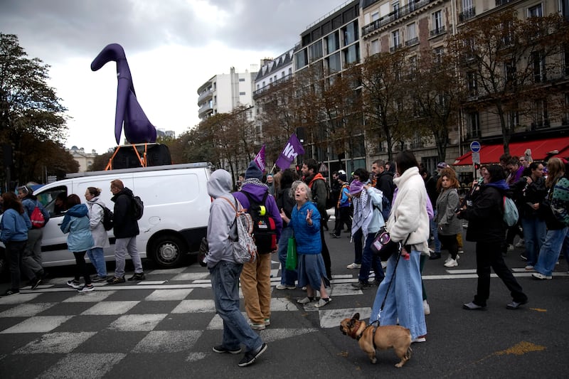 Demonstrators attend a march in support of the right to abortion for women across the world, in Paris