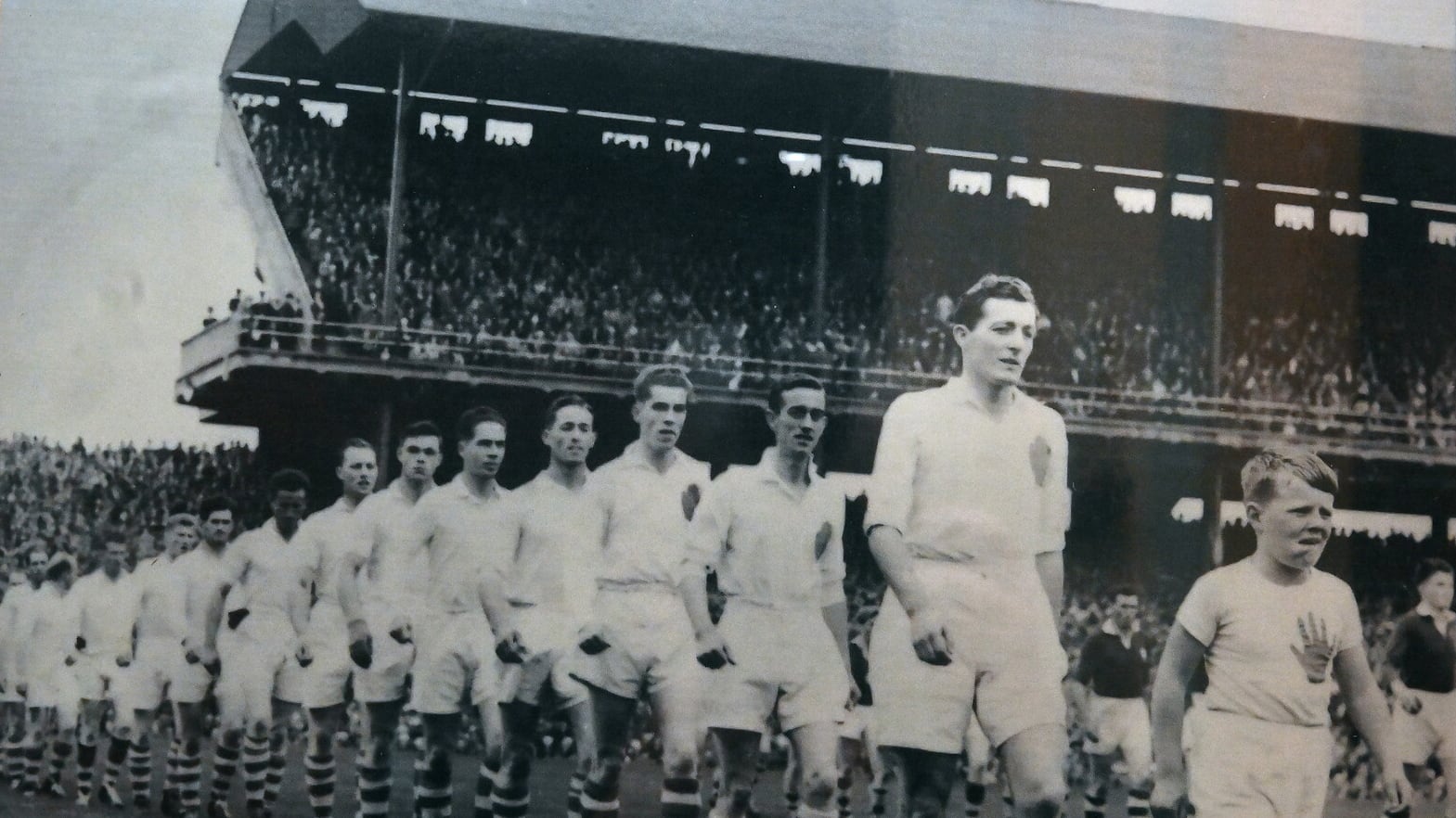 Jody O'Neill captaining Tyrone in the 1956 All-Ireland SFC semi-final against Galway. The late Jim Devlin was a key member of that Red Hand squad