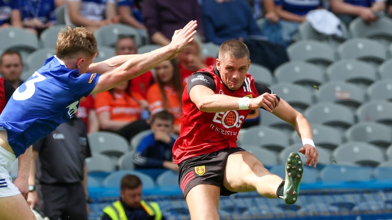 Down’s Pat Havern scores a point  during Saturday’s Tailteann Final at Croke Park in Dublin.
PICTURE COLM LENAGHAN