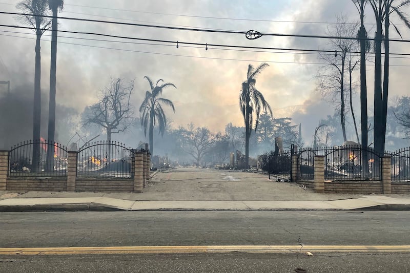 Homes have been destroyed in the fires, which firefighters are battling to control (EJ Soto/AP)