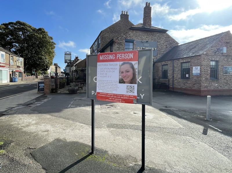 A poster appealing for information regarding Victoria Taylor outside the Derwent Arms public house in Malton