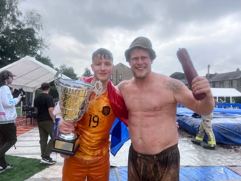 George Young and another competitor at the World Gravy Wrestling Championships.