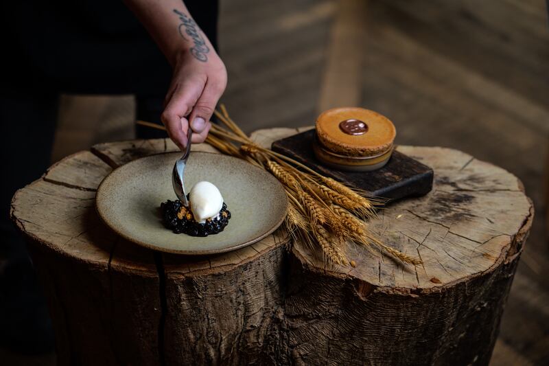 Niklas Ekstedt’s ceps souffle with blueberries and milk ice cream