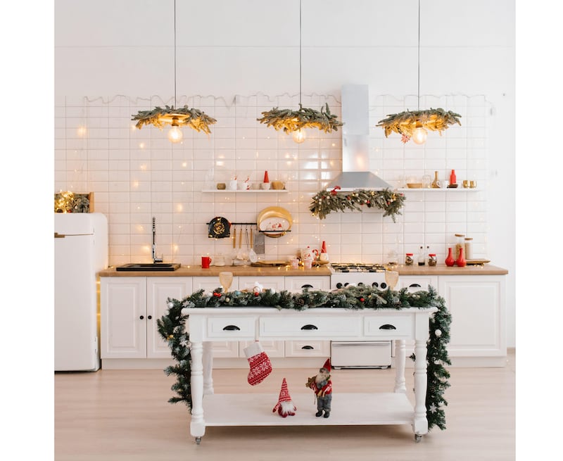 Festive kitchen with Christmas decos, garland and stocking