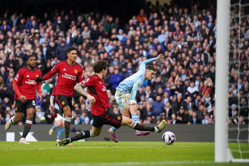Phil Foden scores Manchester City’s second of the derby