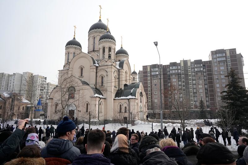 Hundreds gather outside the Church of the Icon of the Mother of God Soothe My Sorrows, in Moscow (AP)