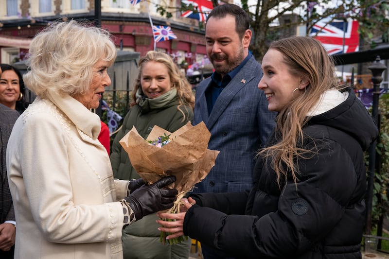 Camilla, then the Duchess of Cornwall, meeting Maddy Hill, Danny Dyer and Rose Ayling-Ellis during a visit to the set of Eastenders at the BBC studios in Elstree