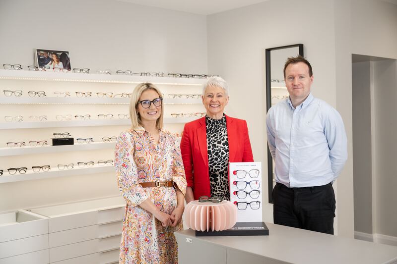Opticare and Audiocare’s new Lisburn Road branch was officially opened by Pamela Ballantine (centre), who is starring in Audiocare’s first ever advert which has just launched on TV. She is pictured with Jade (left) and Michael (right) McCourt.