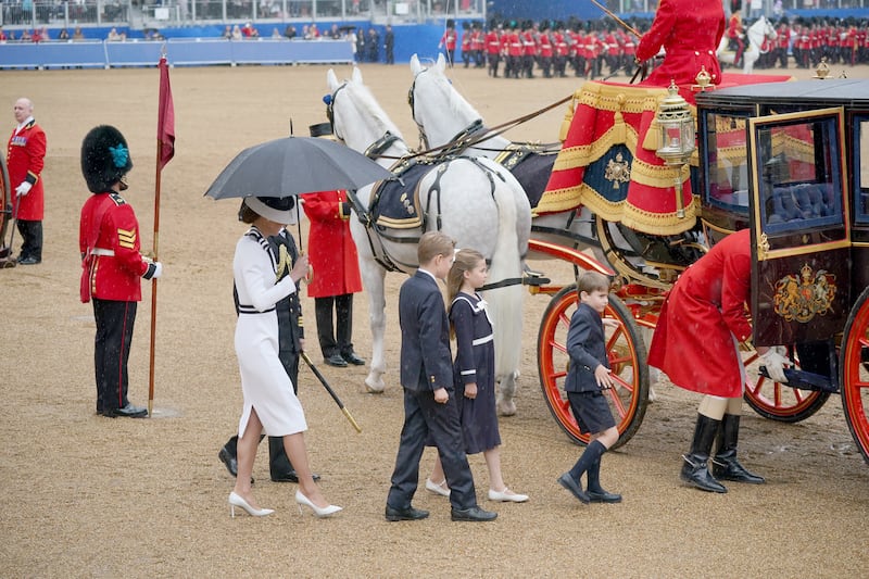 The Princess of Wales, Prince George, Princess Charlotte, and Prince Louis leave Horse Guards Parade after the Trooping the Colour ceremony