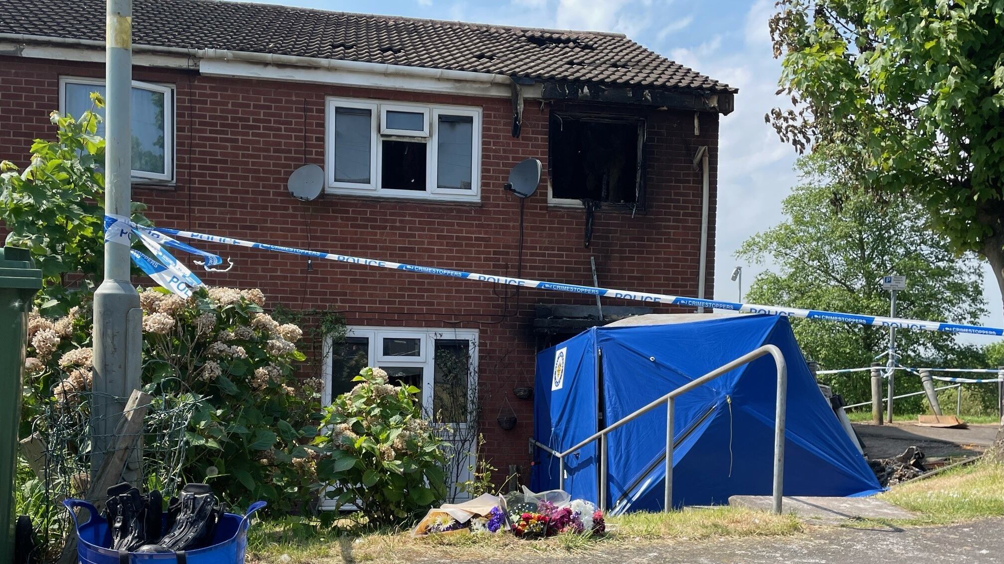 The scene in Dunstall Hill, Dunstall Park, Wolverhampton, after two women were killed in a fire
