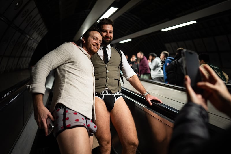 Men strutting on the escalators on the London Underground