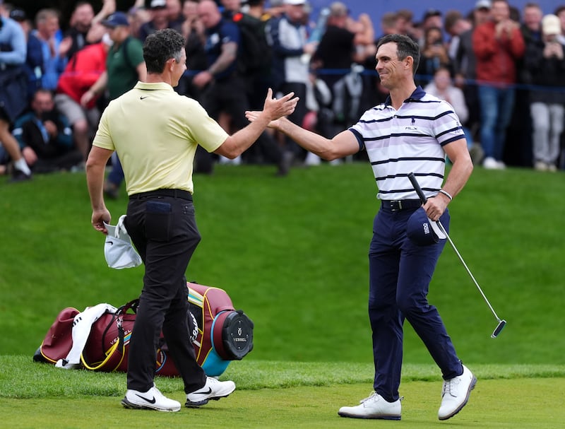 Rory McIlroy congratulates Billy Horschel following a play-off for the BMW PGA Championship at Wentworth