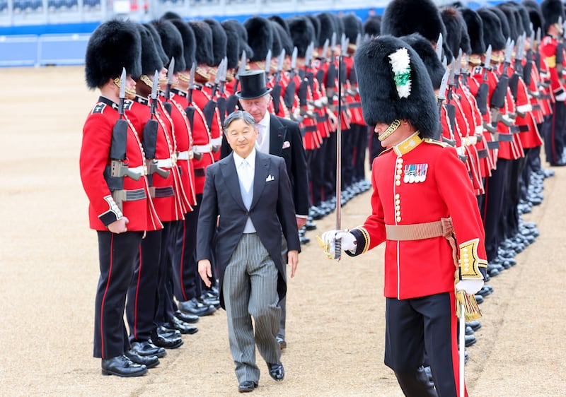 The King and Emperor Naruhito of Japan inspect the guard of honour formed of the 1st Battalion Welsh Guards in June