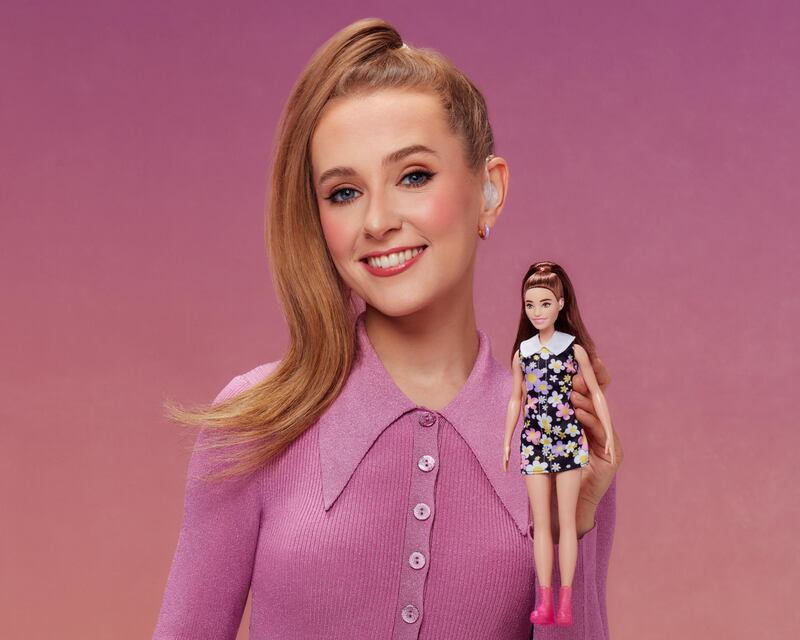 Rose Ayling-Ellis with the Barbie with behind-the-ear hearing aids (Simon Webb/Mattel)