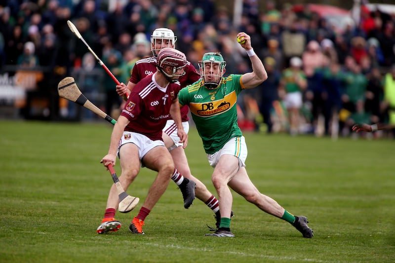 Kevin Molloy takes on Ruairi McCollom and Ryan McCambridge. Picture: Seamus Loughran