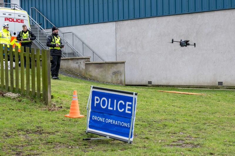 Police are using a drone to aid the search following the discovery of a body on Friday