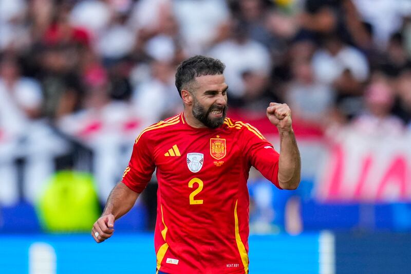 Dani Carvajal scored a third for Spain just ahead of the break (Manu Fernandez/AP)