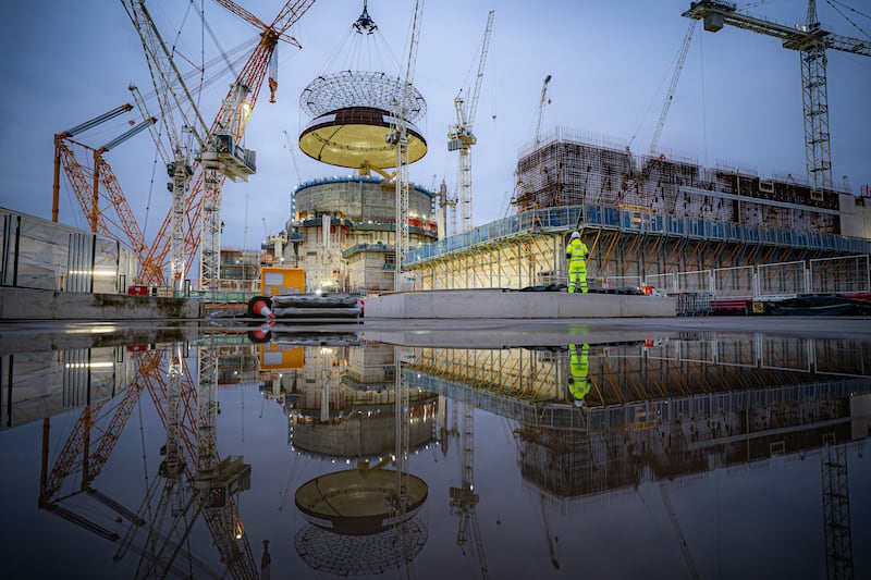 Engineering teams in December 2023 working on Hinkley Point C’s first reactor building, at the nuclear power station construction site in Bridgwater, Somerset