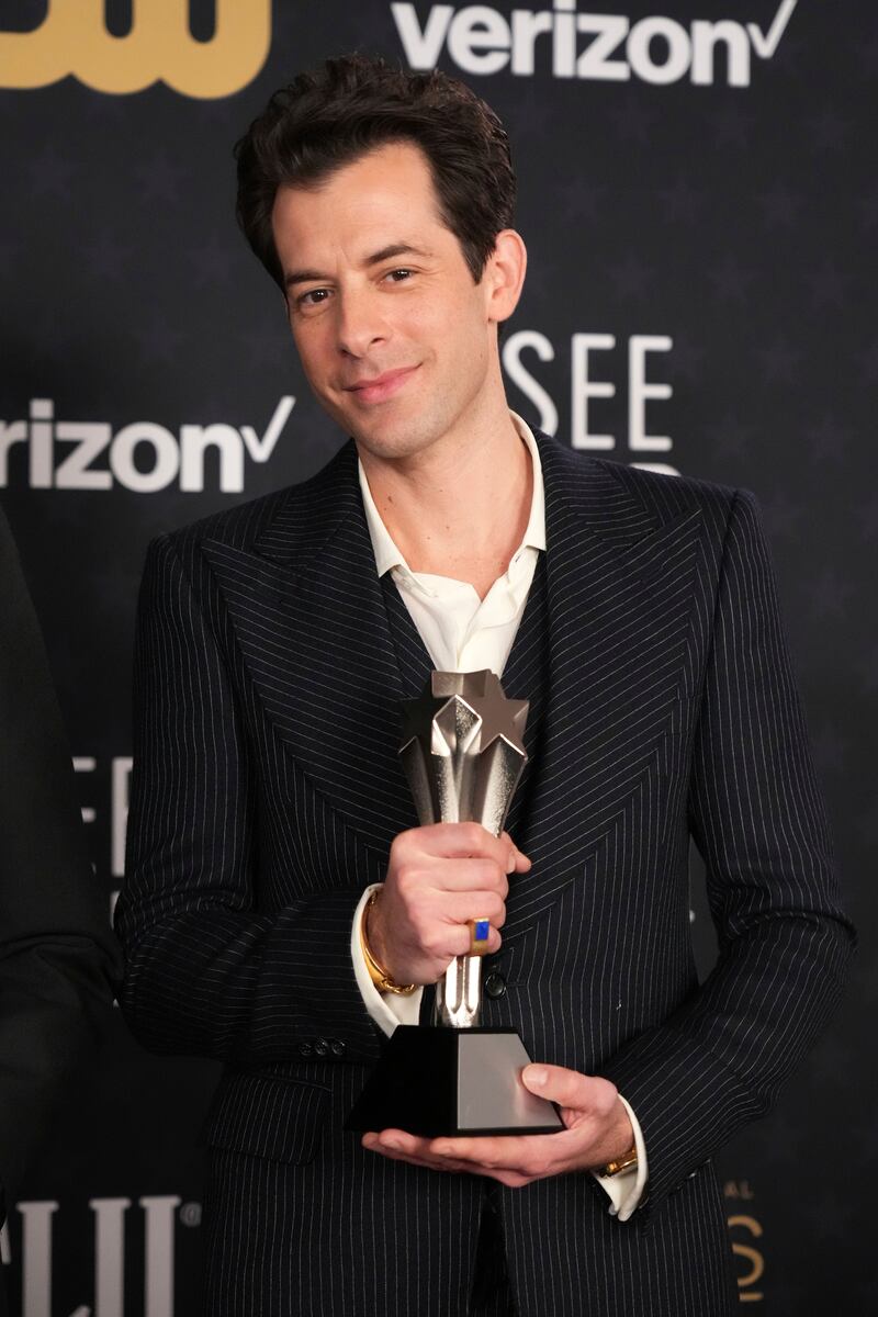 Mark Ronson poses in the press room with the award for best song for I’m Just Ken from Barbie (Jordan Strauss/Invision/AP)