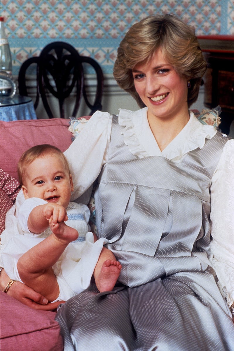A baby Prince William with his mother the Princess of Wales in 1983