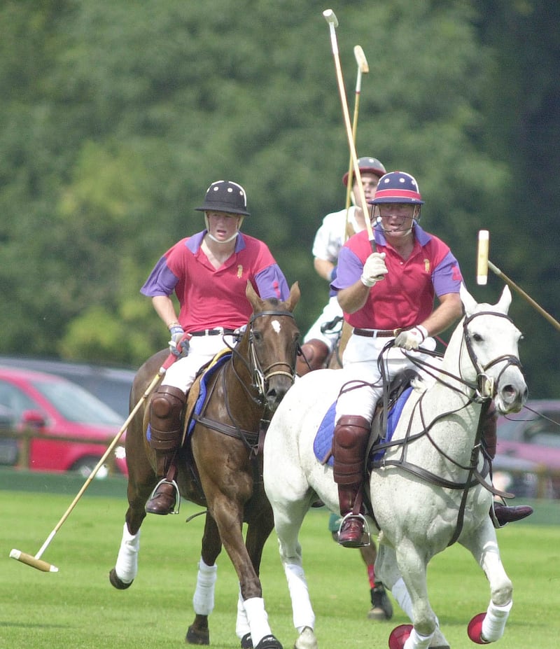 Prince Harry playing polo with his father the then Prince of Wales for Highgrove in an exhibition match against Cirencester Park