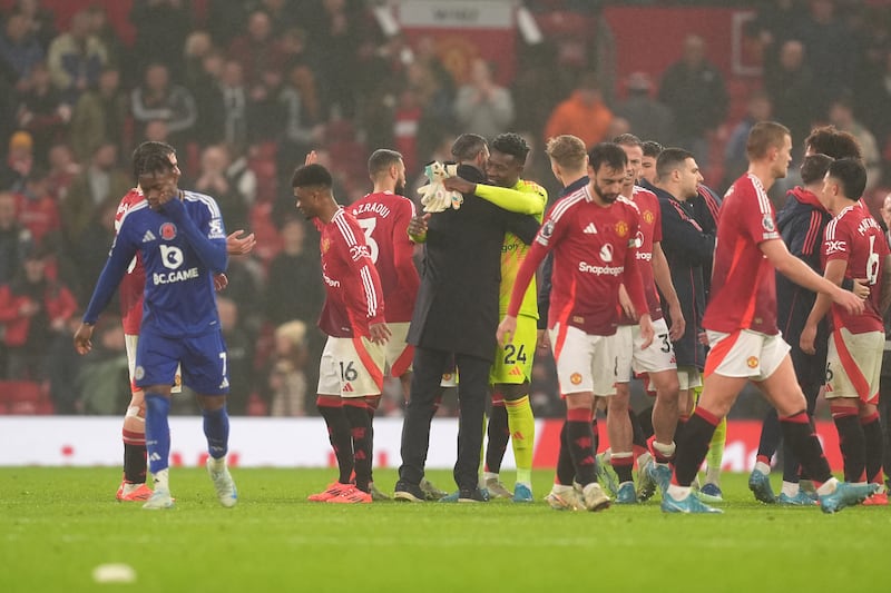 Manchester United interim manager Ruud van Nistelrooy (centre) is waiting to discover his future at the club