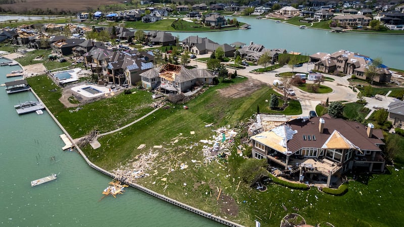 Dozens of reported tornadoes wreaked havoc on Friday in the US Midwest (Chris Machian/Omaha World-Herald via AP)