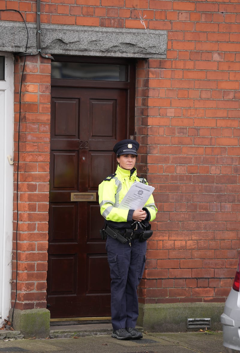 Gardai outside a house in Dundalk, Co Louth as they search a former family home in the investigation into the suspected murder of eight-year-old Kyran Durnin