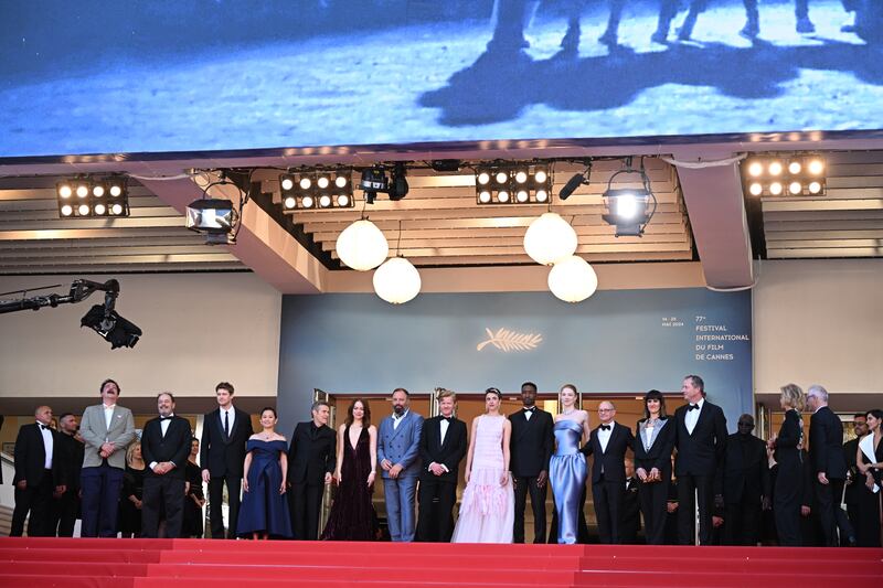 Cast members attend the Kinds Of Kindness premiere in Cannes