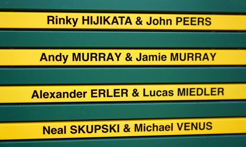 Andy and Jamie Murray’s names are displayed on the order of play