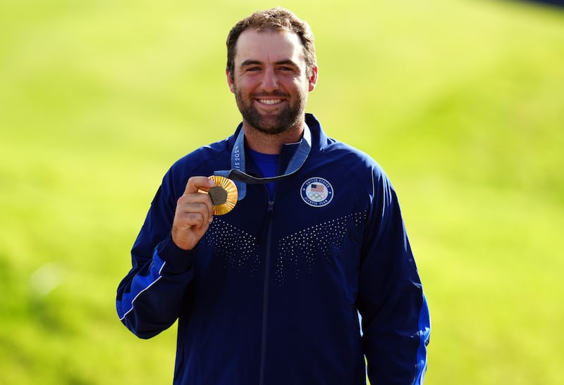 Scottie Scheffler with his gold medal following the Men’s Individual Stroke Play competition at Le Golf National on the ninth day of the 2024 Paris Olympic Games