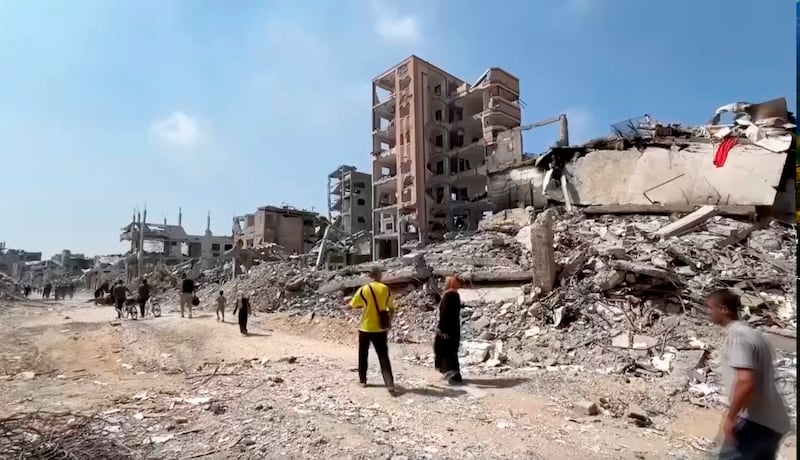Palestinians returned to scenes of utter destruction in Gaza City’s Shuja’iyyah area (AP)