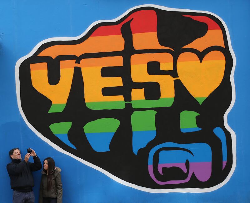 A mural in Dublin&#39;s Temple bar area by street artist SUMS supporting a yes vote in the marriage equality referendum 