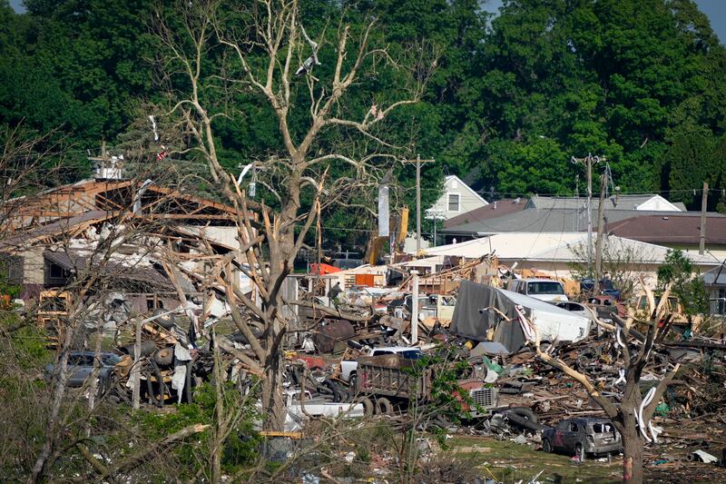 The Greenfield tornado obliterated homes, splintered trees and crumpled cars (Charlie Neibergall/AP)