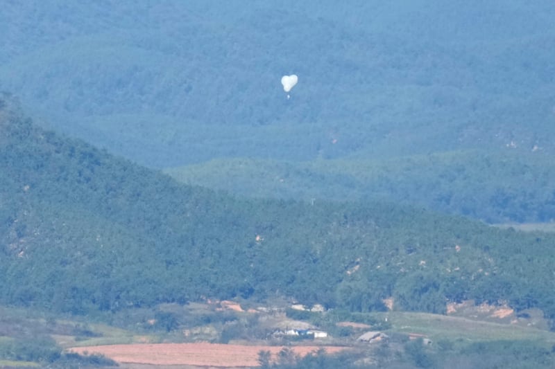 North Korean balloons are seen from the Unification Observation Post in Paju, South Korea (AP)