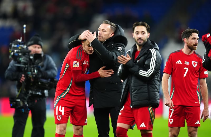 Craig Bellamy (centre) extended his unbeaten start as Wales manager to six games