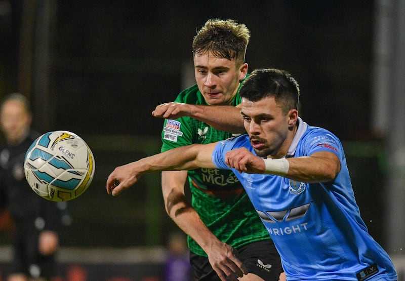 Glentoran v Ballymena: Jonathan Russell of Glentoran tackles Joe Moore of Ballymena during this Evening’s game at the Bet McLean Oval, Belfast