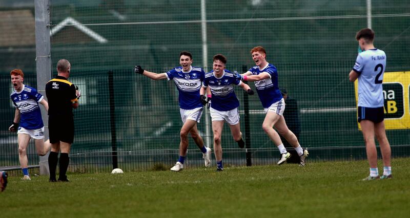 26/12/2024   Fourmasters  player   Theo Colhoun celebrates scoring a goal along with players Kevin Muldoon and Darragh Griffin    in yesterdays  Semi Final game at St Pauls Gac  Picture   Seamus Loughran