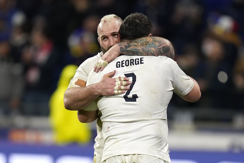 Joe Marler and Jamie George embrace after England’s narrow defeat by France in March